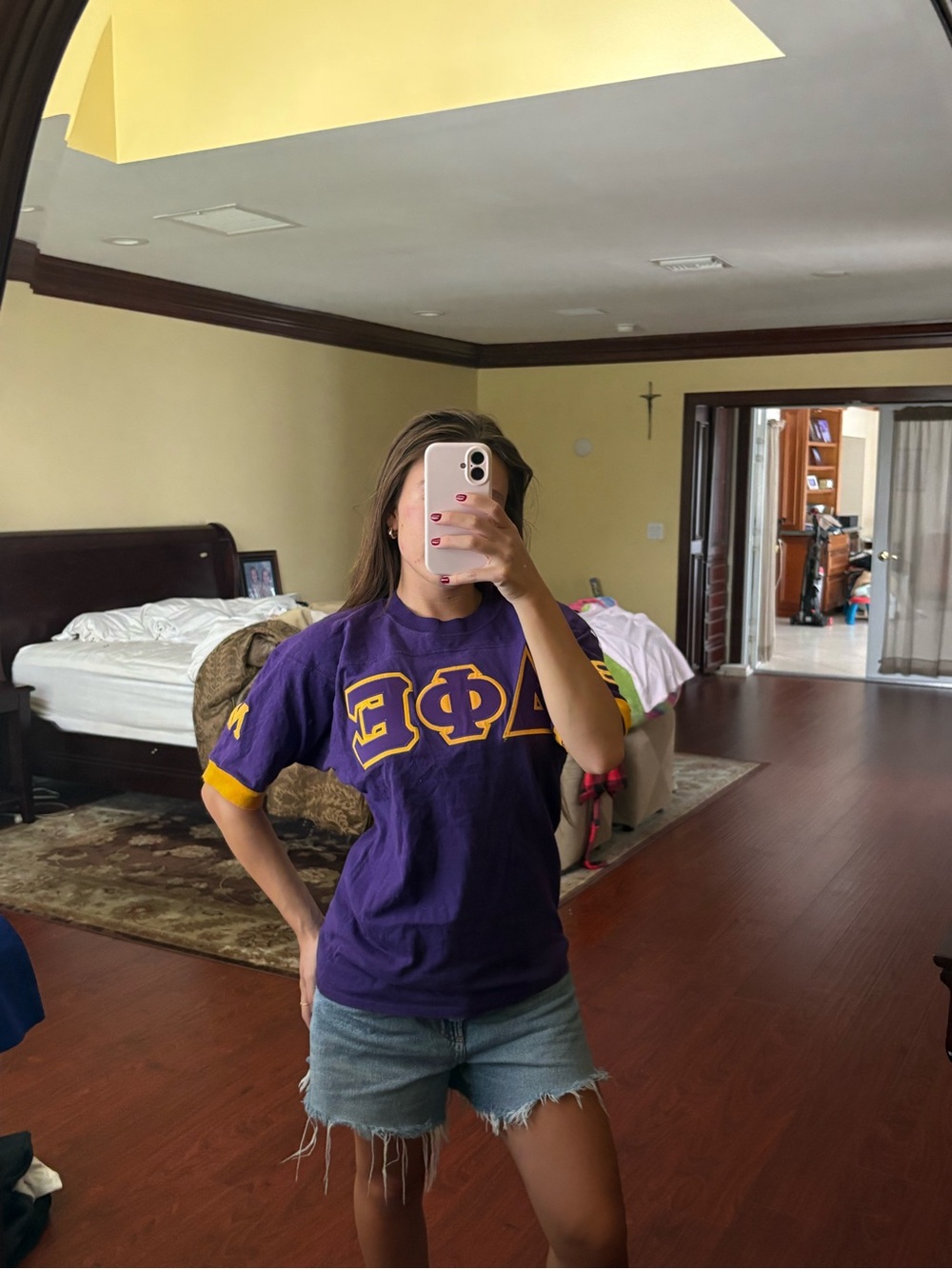 Delta Phi Epsilon purple and yellow sorority letter tee